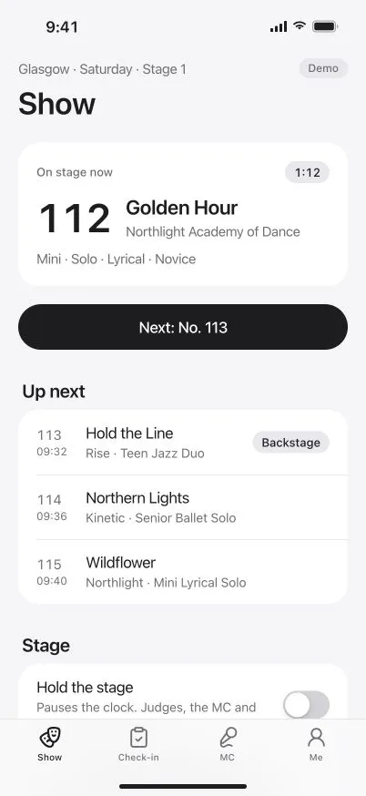 DanceKomp Genius on iPhone: the stage manager’s Show tab for Glasgow, Stage 1: Golden Hour on stage with its timer, Next: No. 113, and the routines up next. Demo data.
