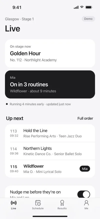 DanceKomp Genius on iPhone: a parent’s Live tab: on stage now, and Mia on in three routines. Demo data.